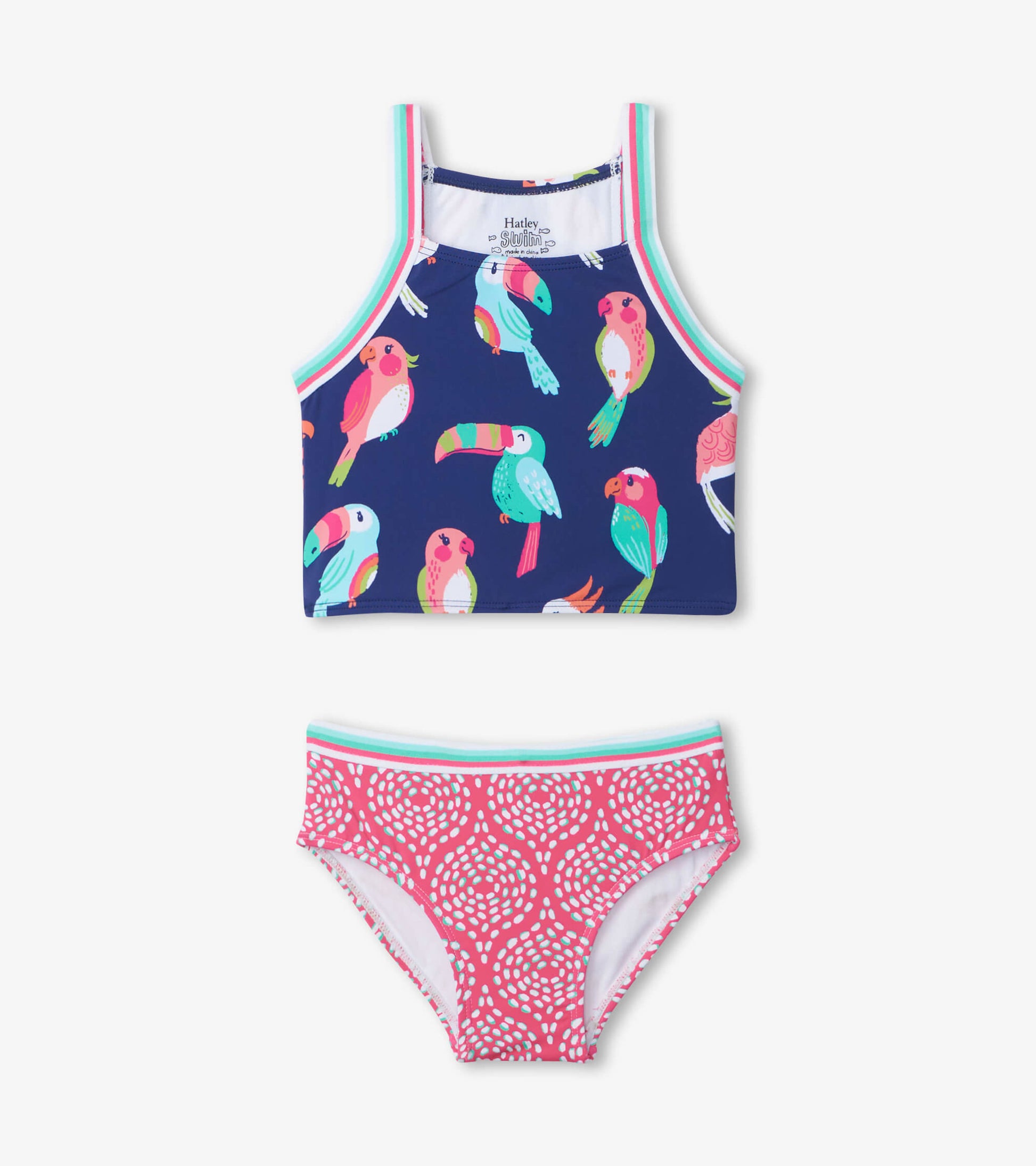 Navy tankini top with colorful tropical bird print and pink patterned bottoms, featuring a comfortable fit for kids.