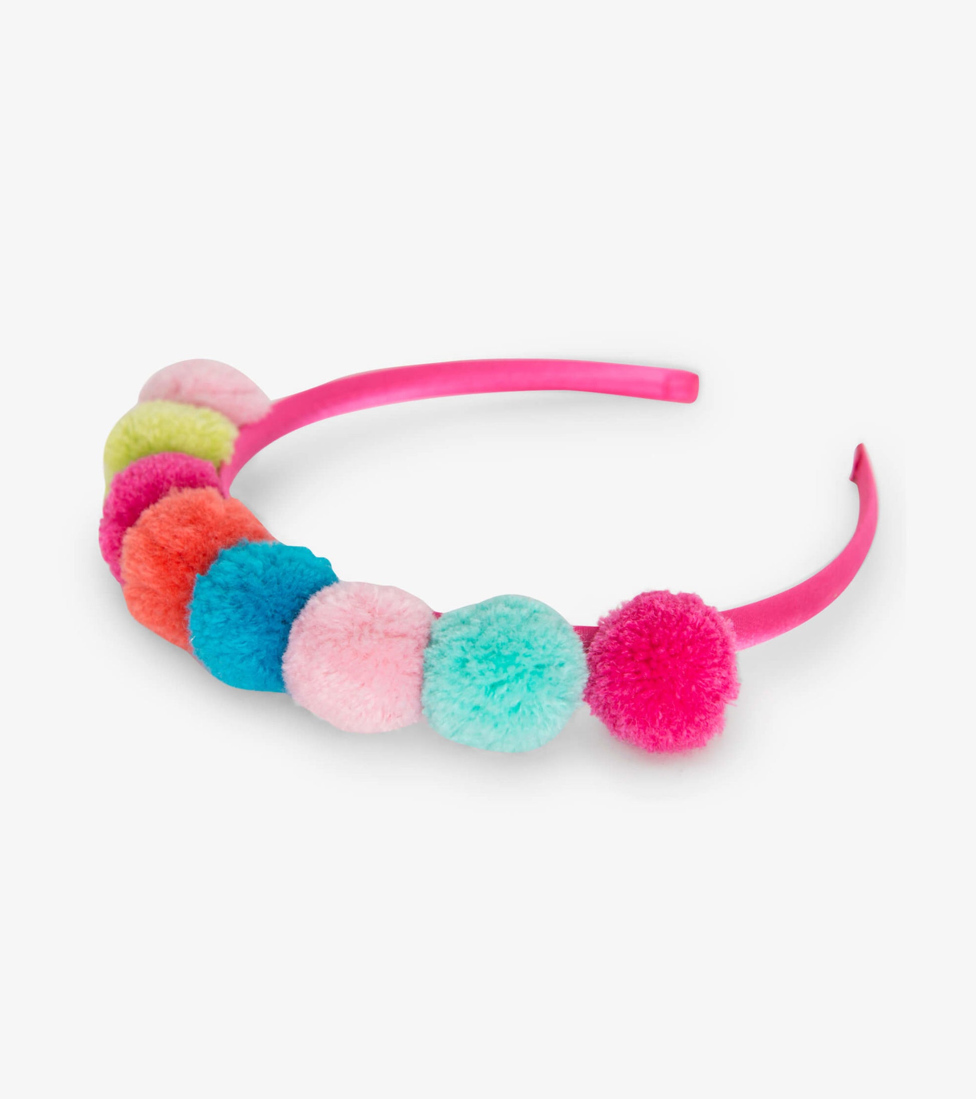 Bright pink headband adorned with colorful pom poms in various shades, perfect for kids' accessories.