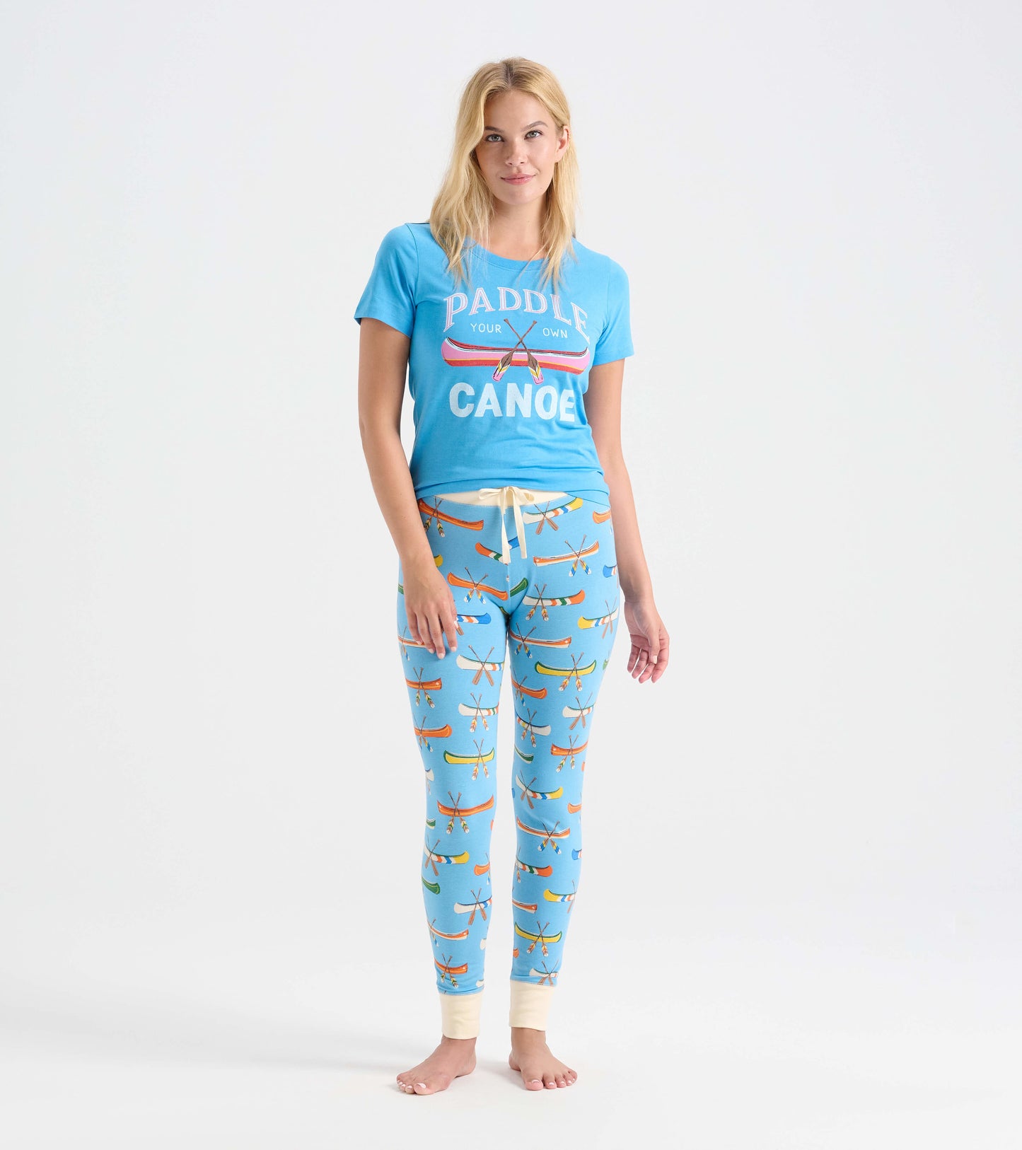 Light blue sleep leggings featuring a canoe print, with a comfortable fit and elastic waistband.