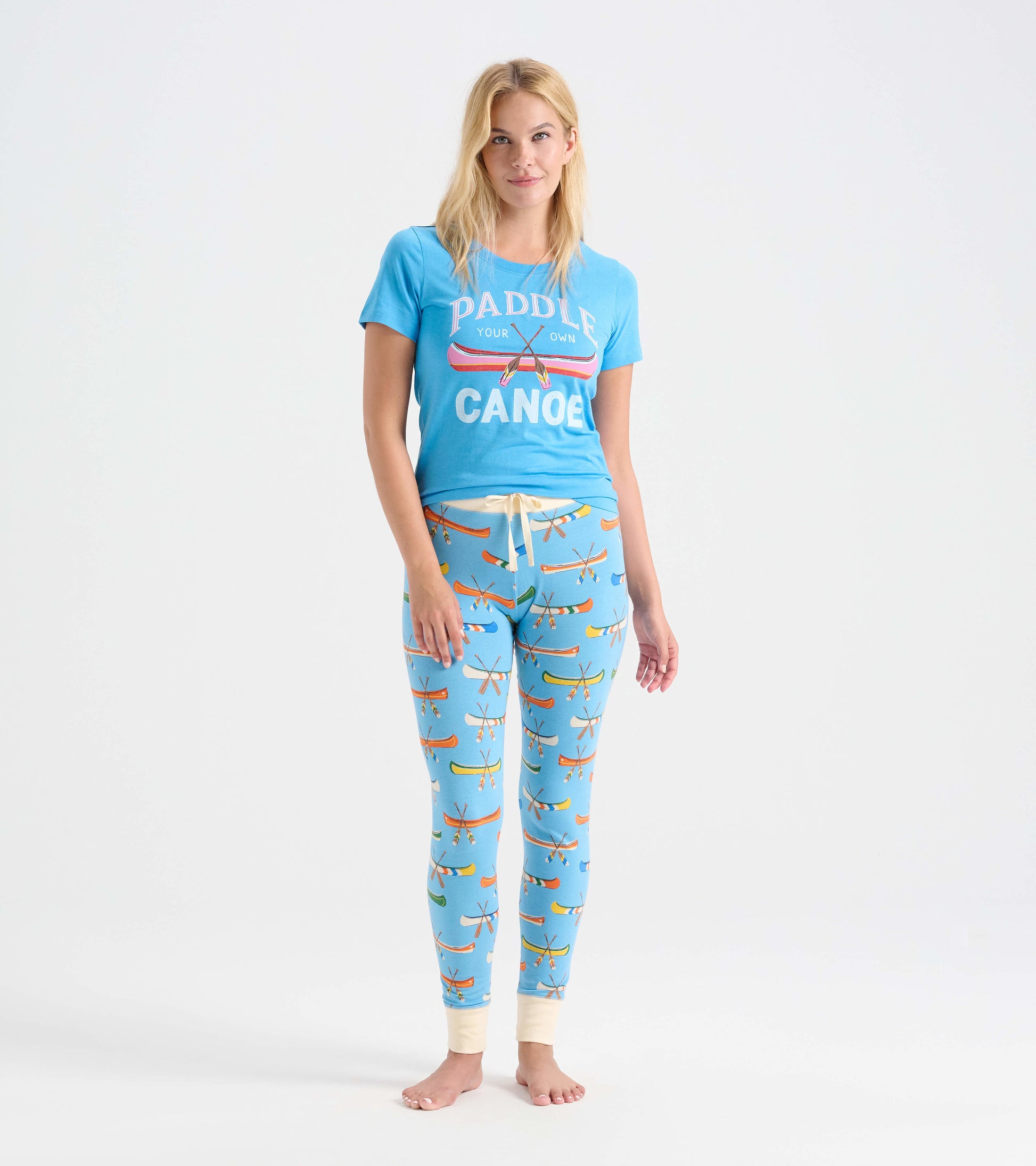 Light blue sleep leggings featuring a canoe print, with a comfortable fit and elastic waistband.