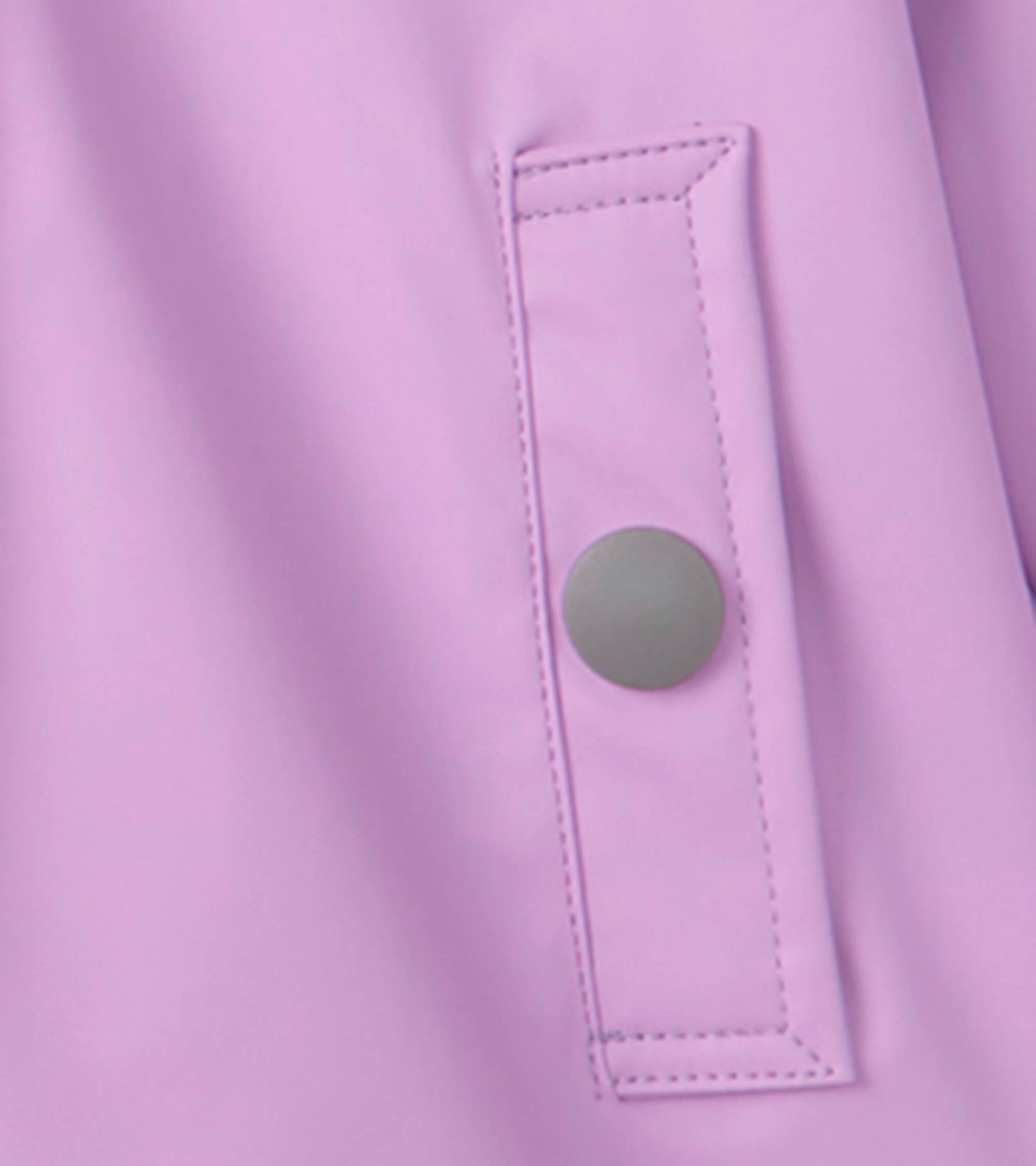 Lilac button-up rain jacket featuring a snap button detail and smooth, waterproof material.