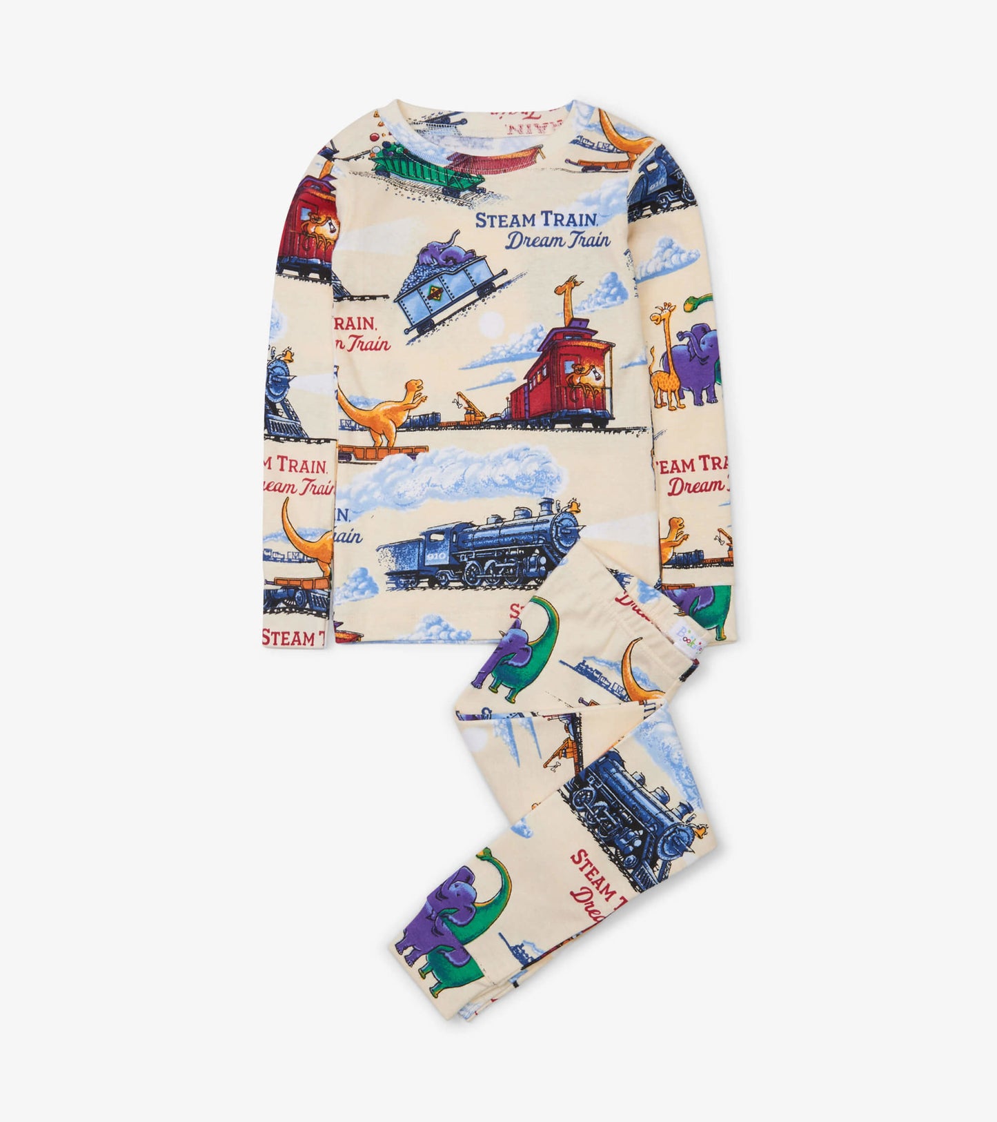 Cream pajama set featuring colorful train and dinosaur patterns, includes long-sleeve top and matching pants.