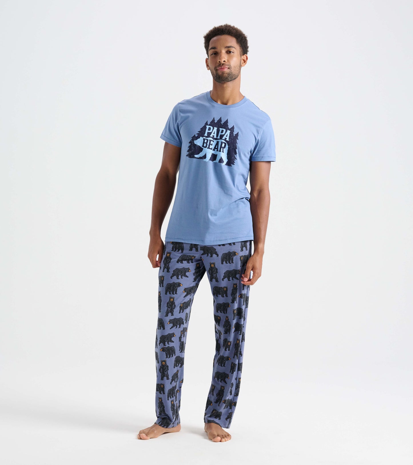 Light blue men's tee featuring a "Papa Bear" graphic, paired with patterned pajama pants displaying black bears.