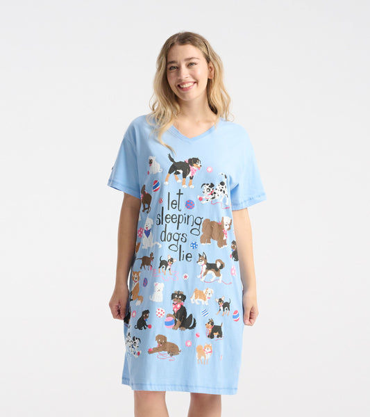 Light blue sleepshirt featuring a playful dog print and the phrase "let sleeping dogs lie," with a relaxed fit and short sle…