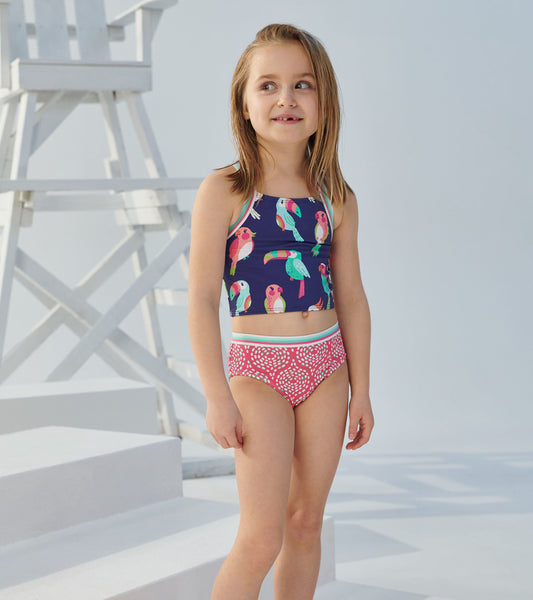 Tankini set featuring a navy top with colorful tropical birds and a pink patterned bottom, ideal for summer wear.