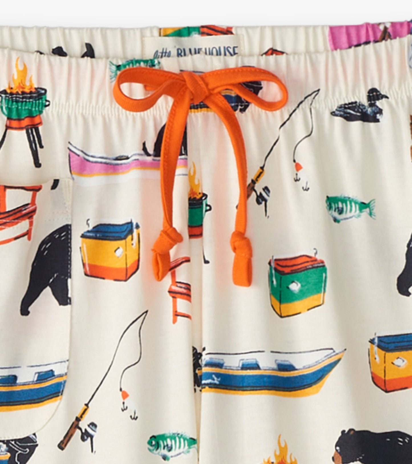 Cream cotton pajama pants featuring colorful lake-themed prints, with an elastic waistband and orange drawstring.