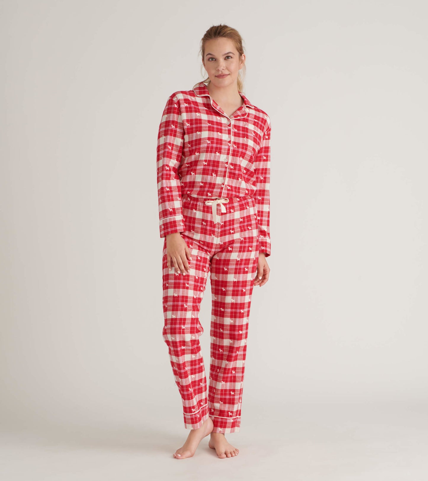 Red and white plaid flannel pajama set with long sleeves and drawstring pants, perfect for cozy lounging.