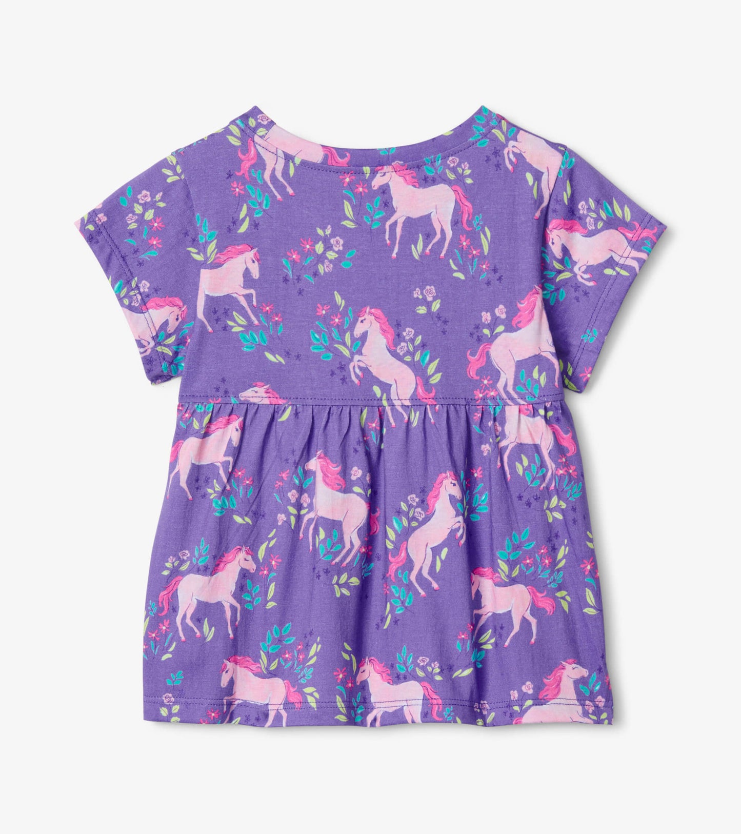 Purple toddler tee featuring a playful unicorn and floral print, with short sleeves and a gathered waist.