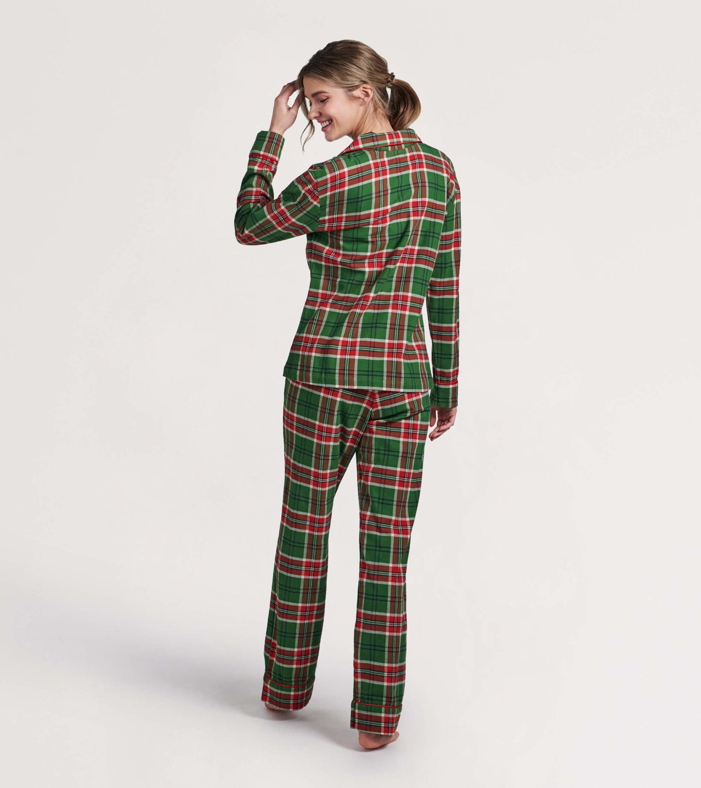 Green and red plaid flannel pajama set featuring a long-sleeve top and matching pants, shown from the back.