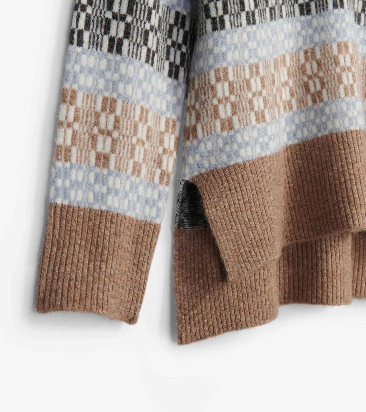 Mock neck sweater featuring a celestial plaid pattern in soft blues, browns, and blacks with ribbed hem and cuffs.
