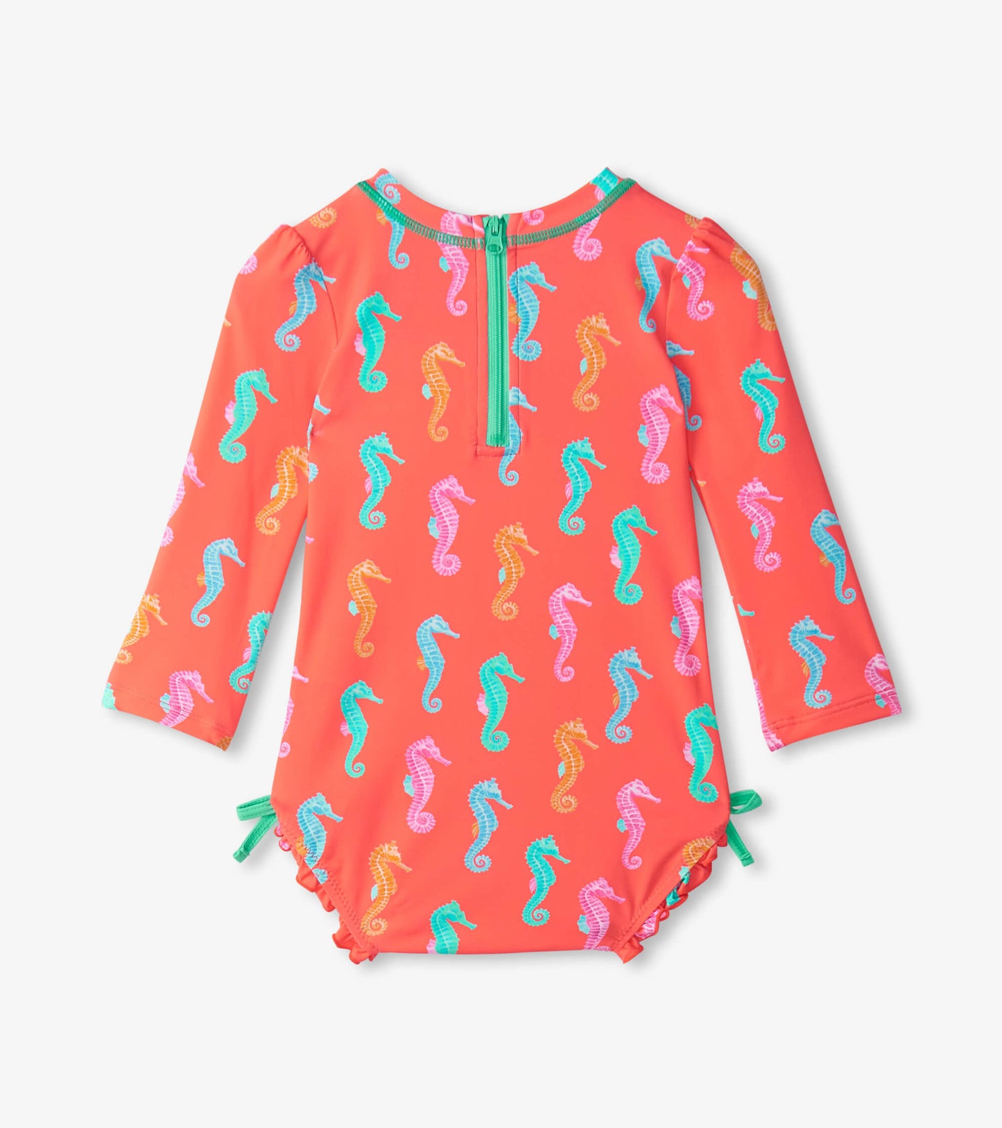 Coral rashguard swimsuit with long sleeves, featuring colorful seahorse patterns and a back zipper closure.