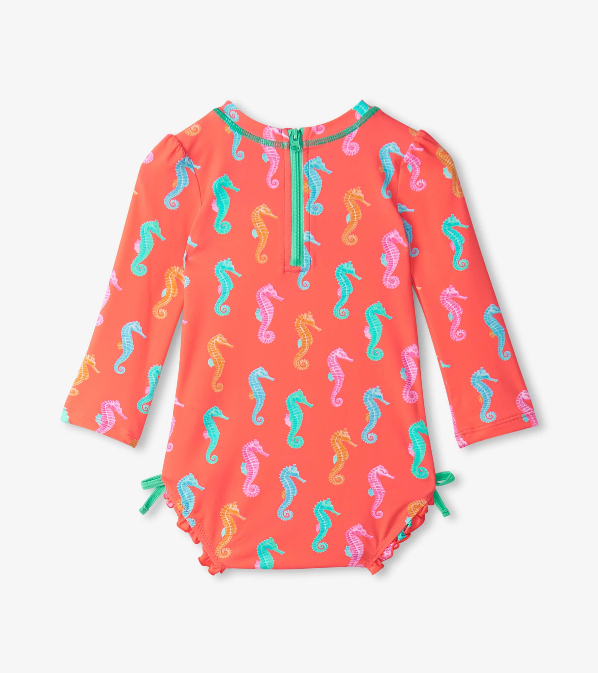 Coral rashguard swimsuit with long sleeves, featuring colorful seahorse patterns and a back zipper closure.