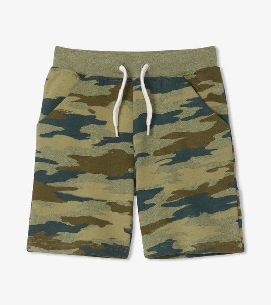 Woodland camo kids' shorts in green and brown tones, featuring an elastic waistband and side pockets.