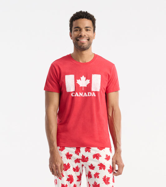 Red short-sleeve tee featuring a white maple leaf and "CANADA" graphic on the front, worn by a smiling man.