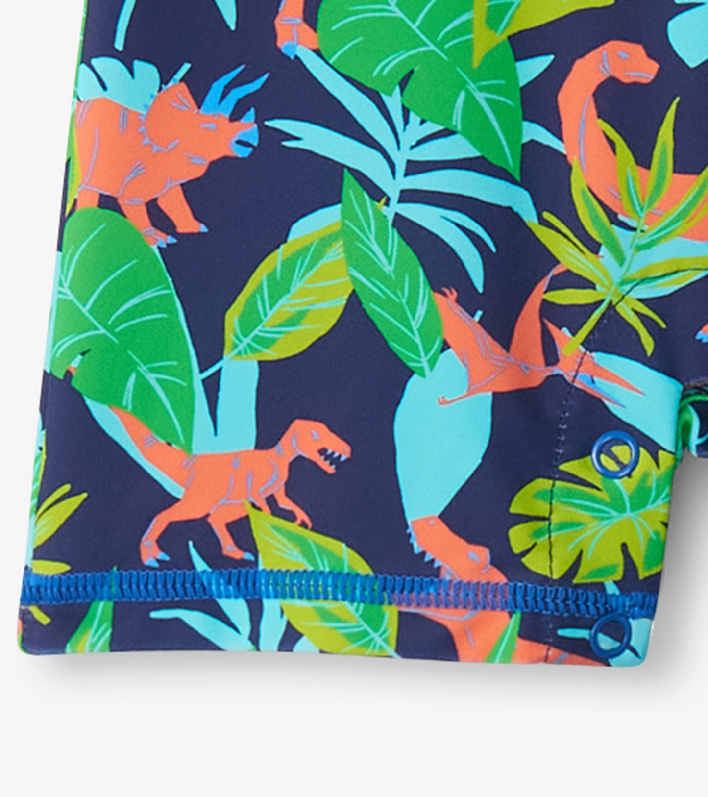 Navy one-piece rashguard featuring colorful dinosaur and leaf patterns, ideal for baby boys.
