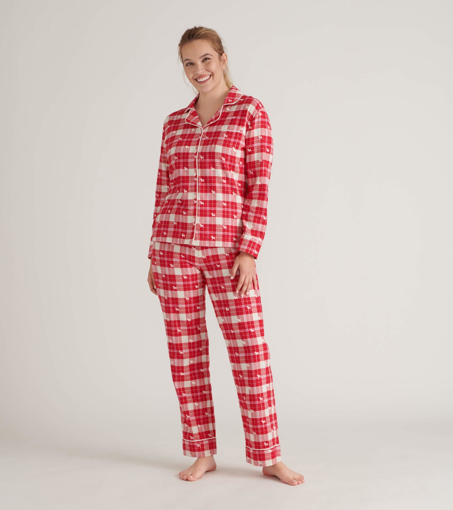 Red plaid flannel pajama set featuring a button-up top and matching pants, ideal for cozy lounging.