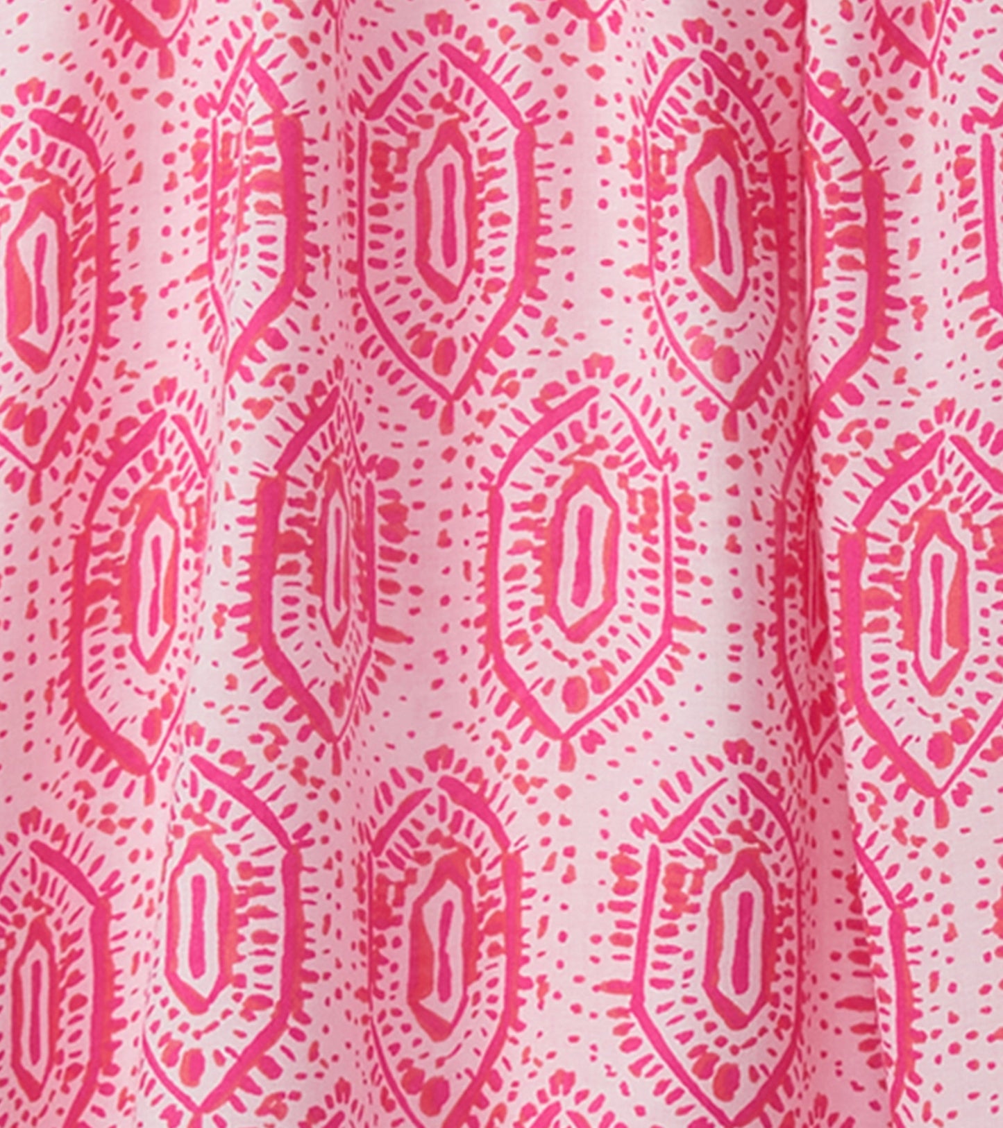 Pink dress featuring a geo mosaic pattern with diamond shapes and dotted accents. Suitable for casual wear.