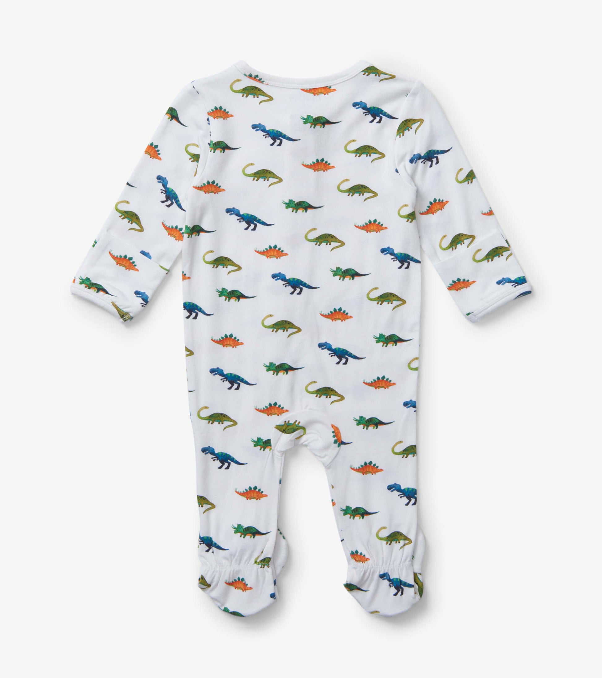 White footed sleeper featuring colorful dinosaur prints in green, blue, and orange, with long sleeves and elastic cuffs.