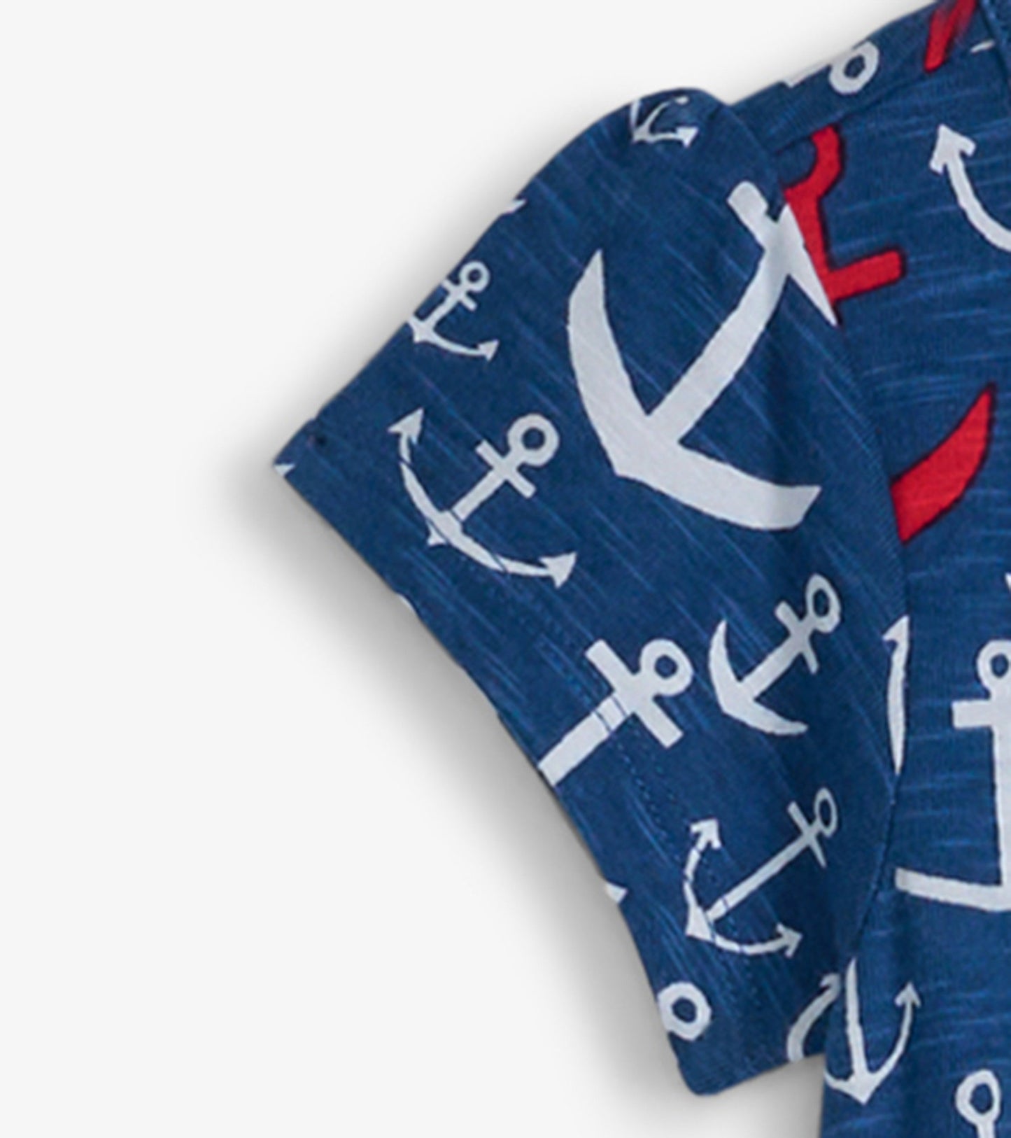 Navy t-shirt dress featuring a stacked anchor pattern in white and red, with short sleeves and a relaxed fit.