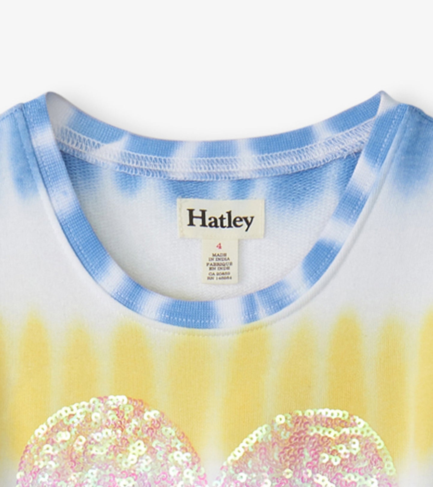 Blue and yellow tie-dye pull-on dress featuring a round neckline and sequin embellishments.