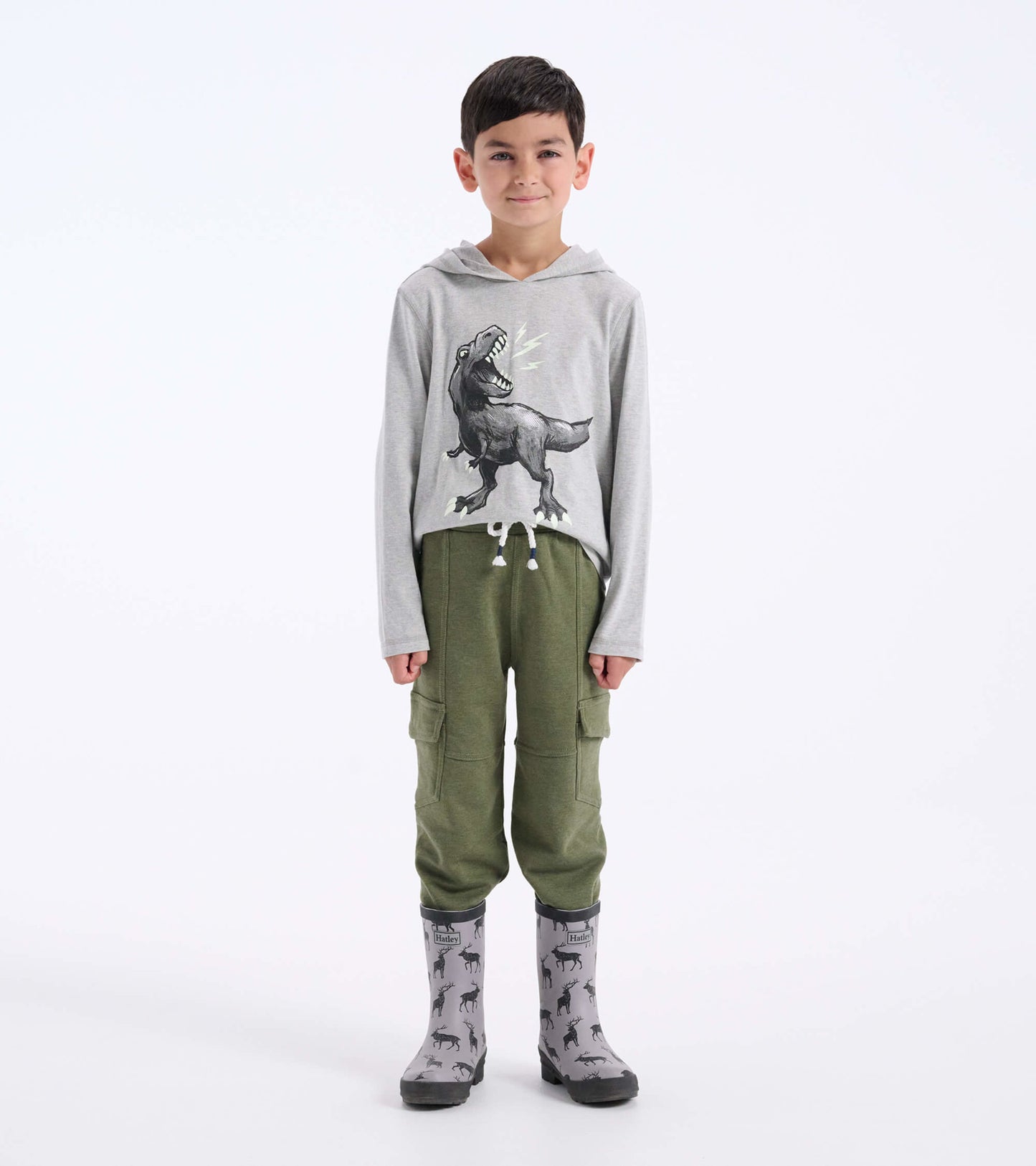 Moss melange cargo joggers in green, featuring side pockets, paired with a gray dinosaur hoodie and patterned rain boots.