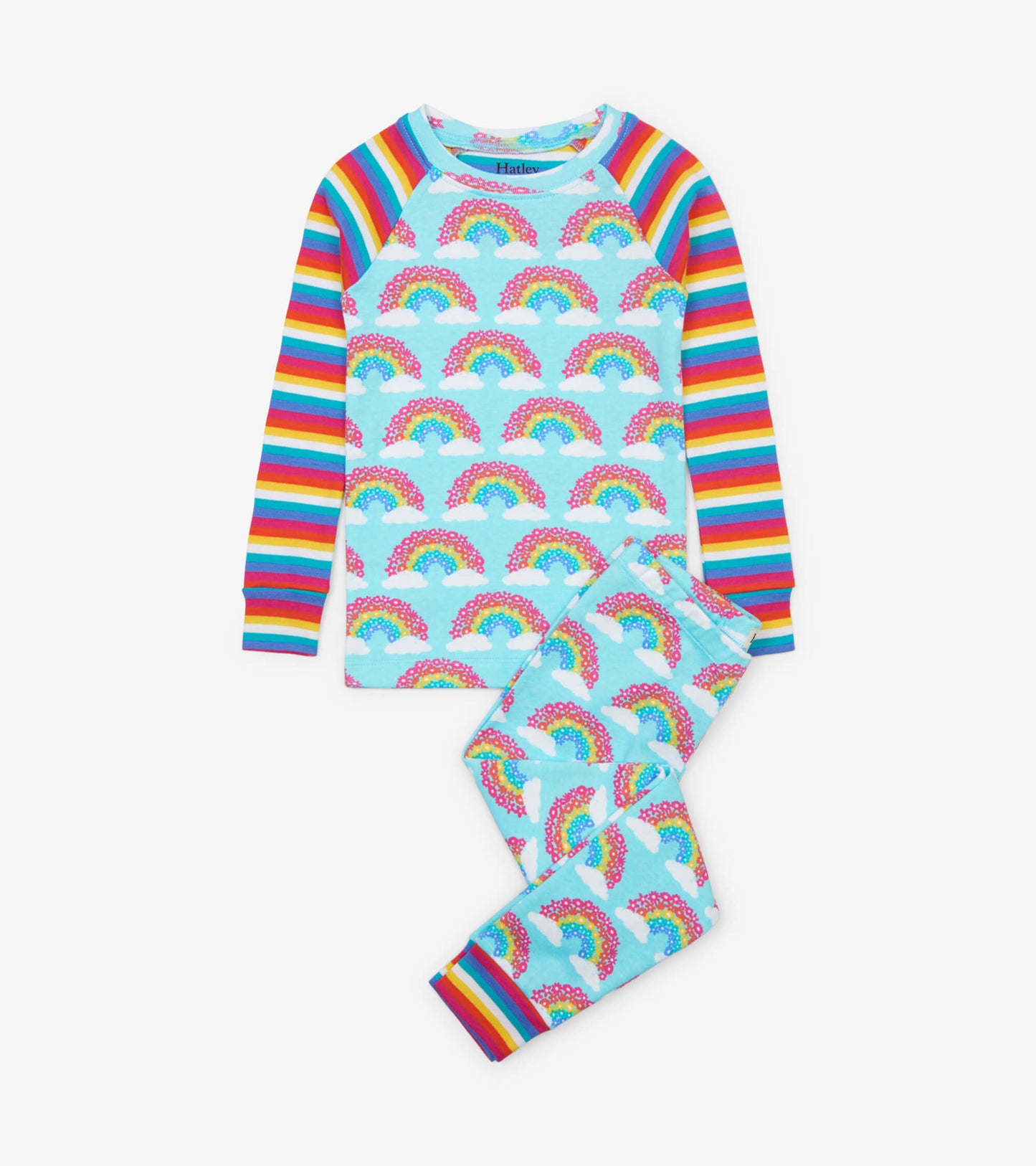 Light blue organic cotton pajama set featuring colorful rainbow patterns and striped sleeves.