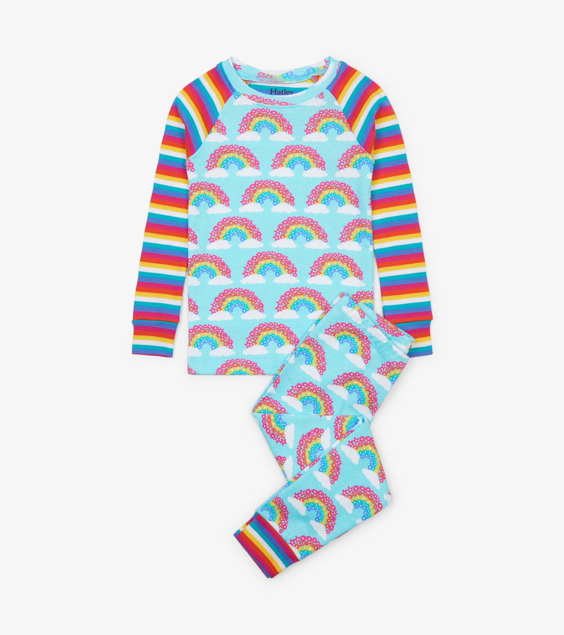 Light blue organic cotton pajama set featuring colorful rainbow patterns and striped sleeves.