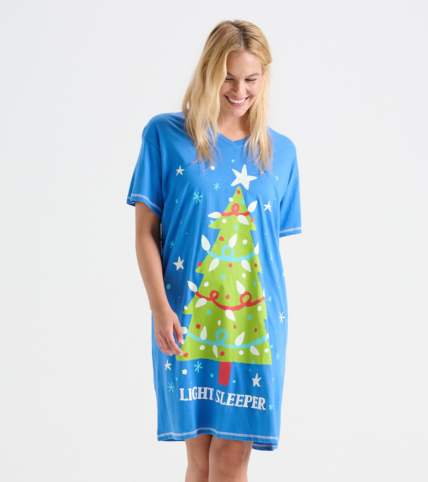 Blue sleepshirt featuring a green Christmas tree design with colorful ornaments and the text "LIGHT SLEEPER.
