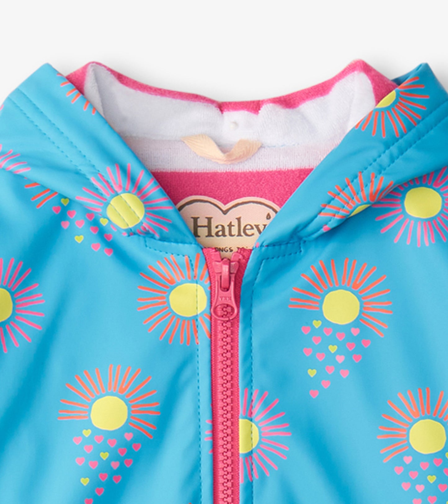 Blue zip-up rain jacket featuring sun and heart patterns, with a pink lining and hood.