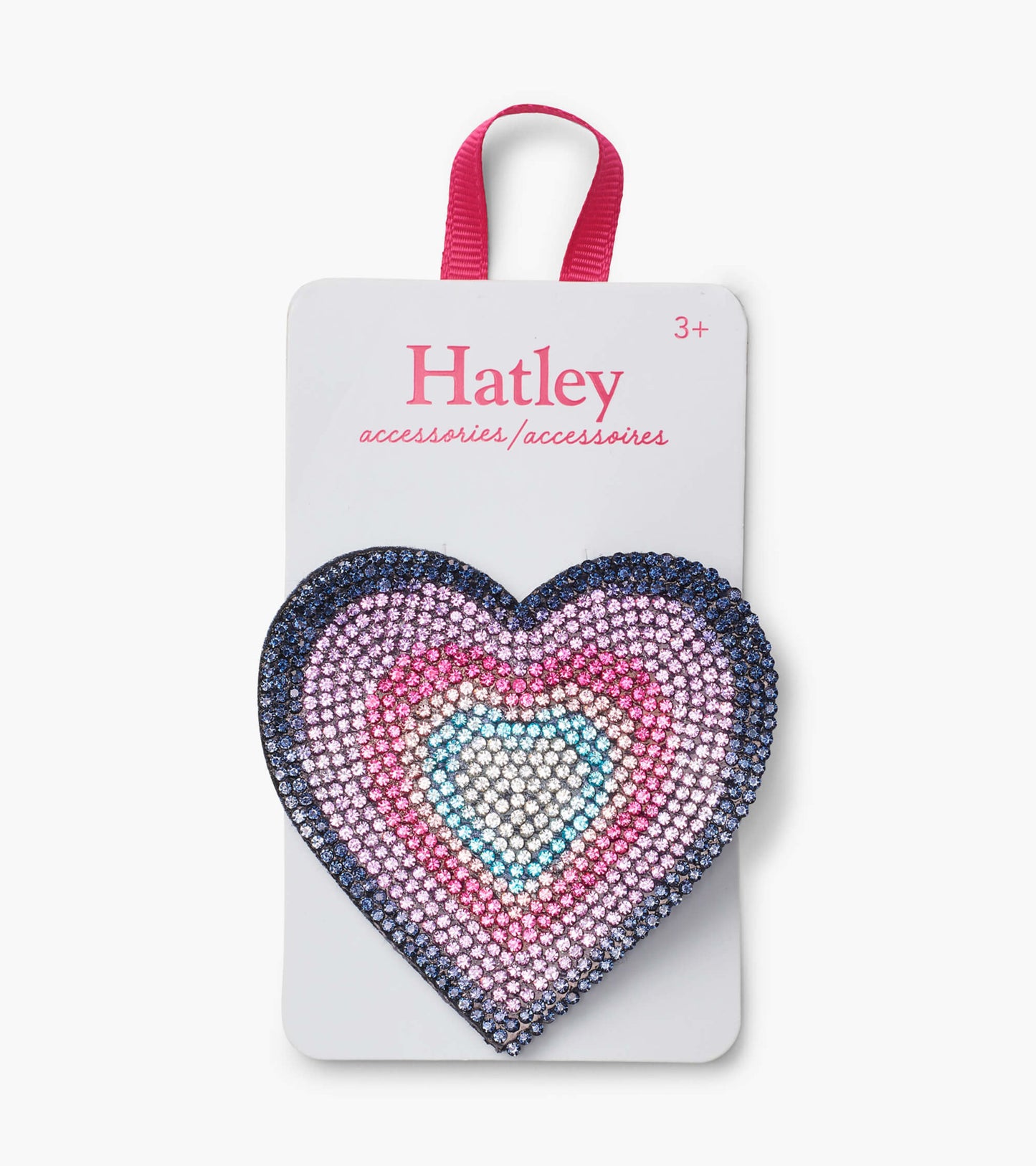 Large heart-shaped hair clip featuring colorful rhinestones in shades of pink, blue, and purple.