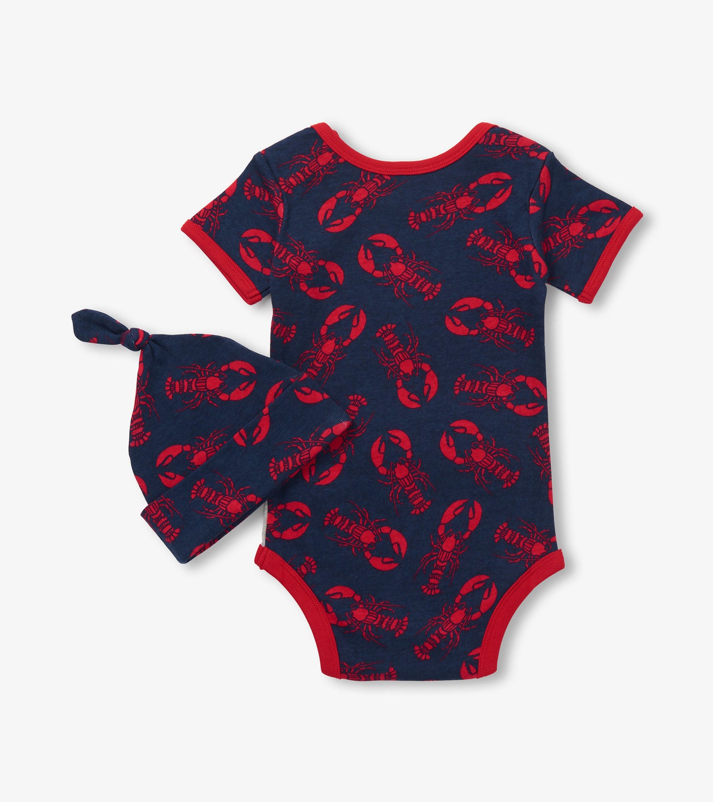 Navy baby bodysuit with red lobster print and matching hat, featuring short sleeves and a snap closure at the bottom.