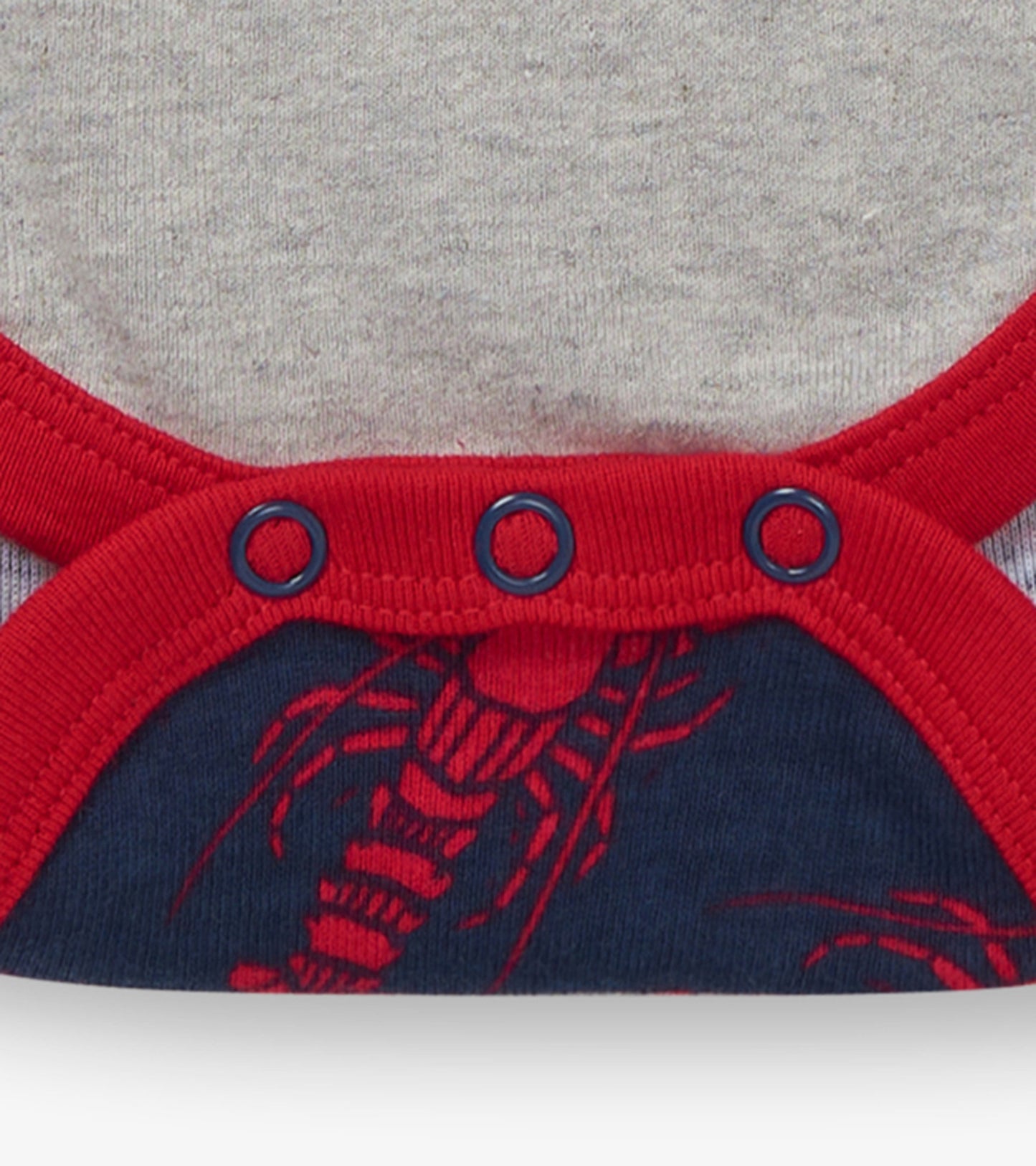 Red and navy lobster-patterned baby bodysuit with snap closures and contrasting trim. Suitable for infants 3-24 months.