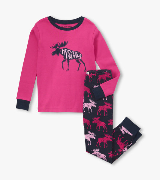 Pink long-sleeve top with moose graphic paired with navy pants featuring moose patterns in pink and red.
