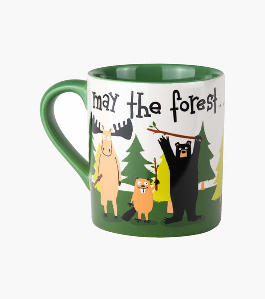 Ceramic mug with green handle, featuring playful forest animals and the phrase "may the forest" on a white background.