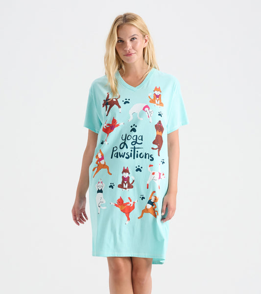 Light blue sleepshirt featuring playful dog illustrations and the text "yoga Pawsitions," with a V-neck and short sleeves.