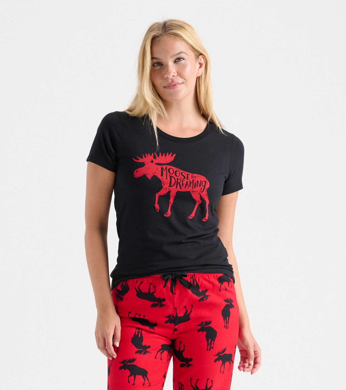 Black pajama t-shirt featuring a red moose graphic and text, styled for casual comfort.