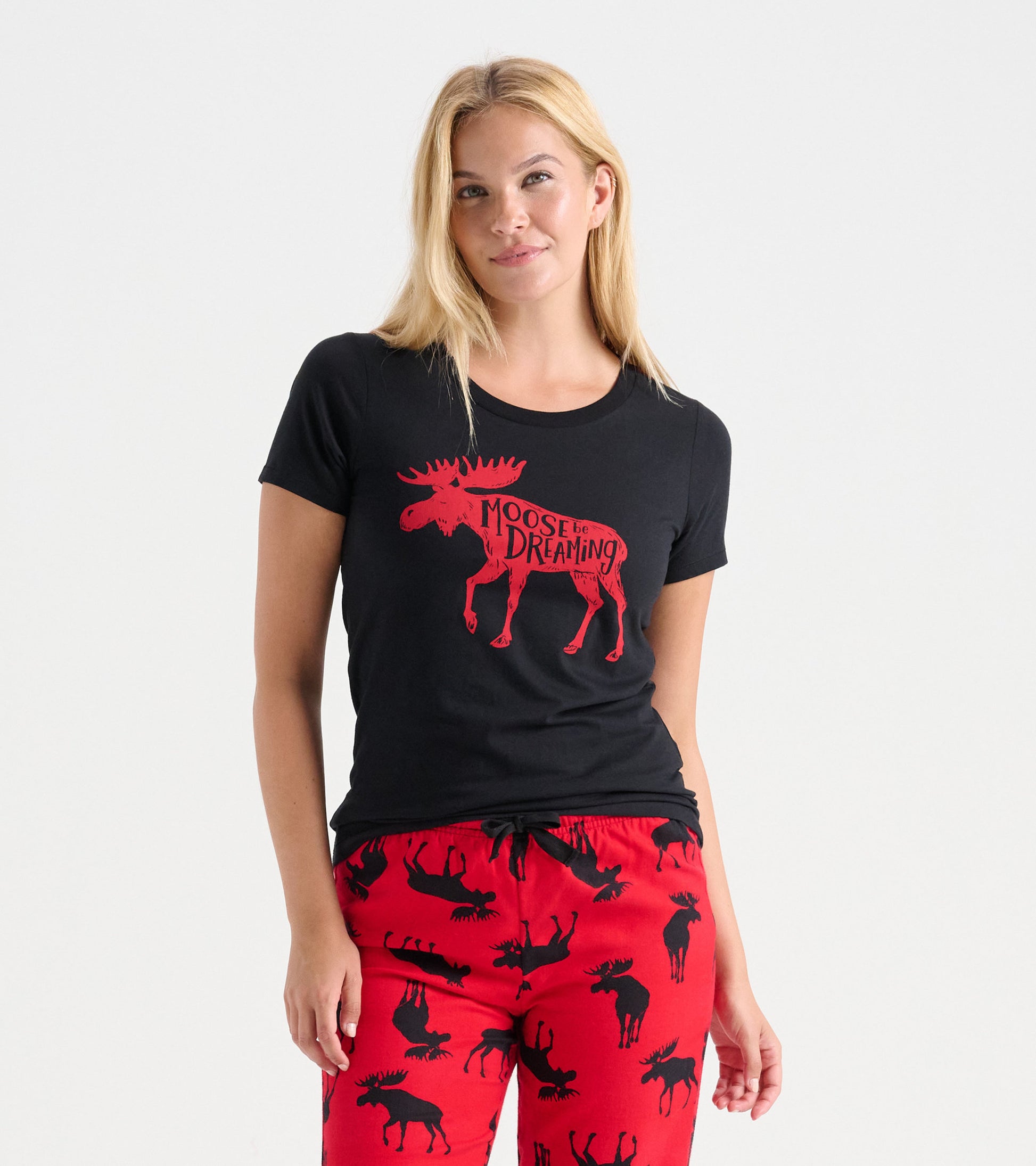 Black pajama t-shirt featuring a red moose graphic and text, styled for casual comfort.