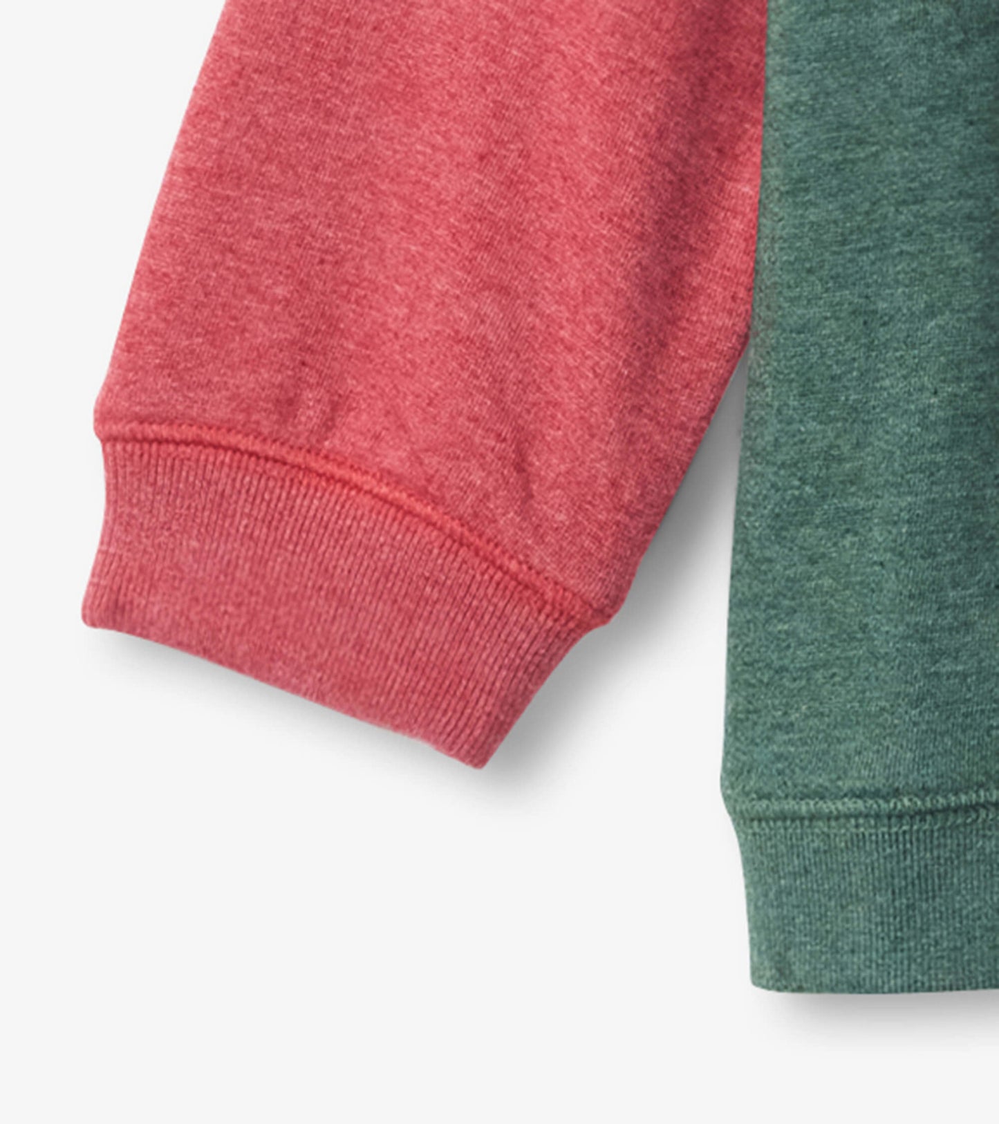 Color-blocked pullover sweatshirt featuring a red sleeve and a green body, made from soft material.