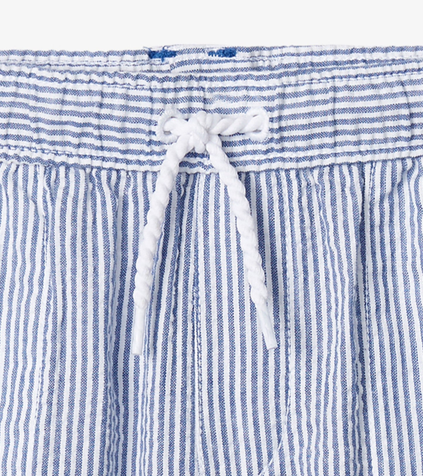 Blue and white striped woven shorts with an elastic waistband and drawstring detail.