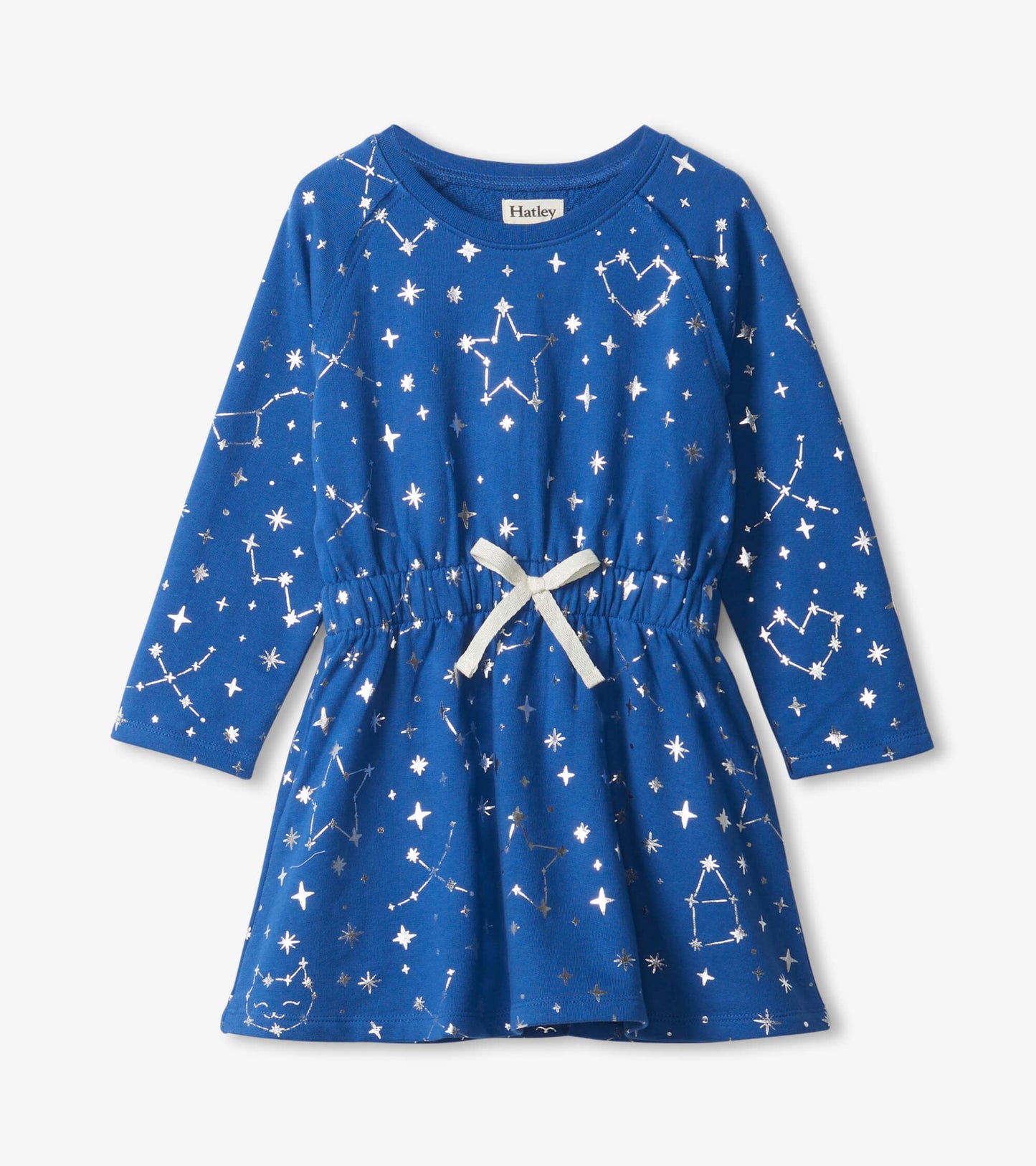 Blue terry dress featuring silver constellations and stars, with a cinched waist and a cream ribbon tie.