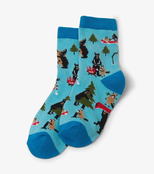 Light blue kids' crew socks featuring playful wildlife patterns, including bears and trees, with contrasting blue cuffs.