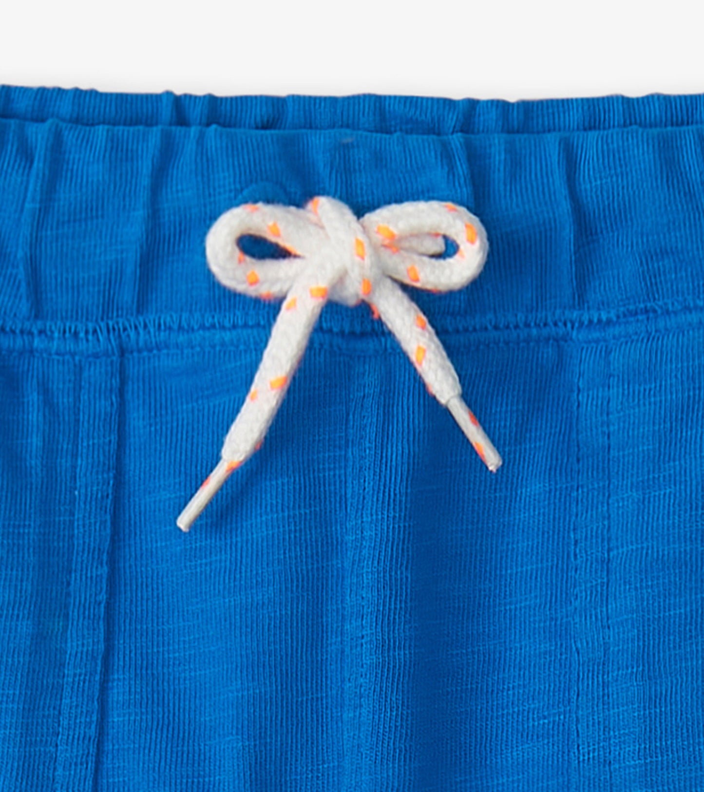 Deep blue relaxed shorts with an elastic waistband and a white drawstring featuring orange accents.