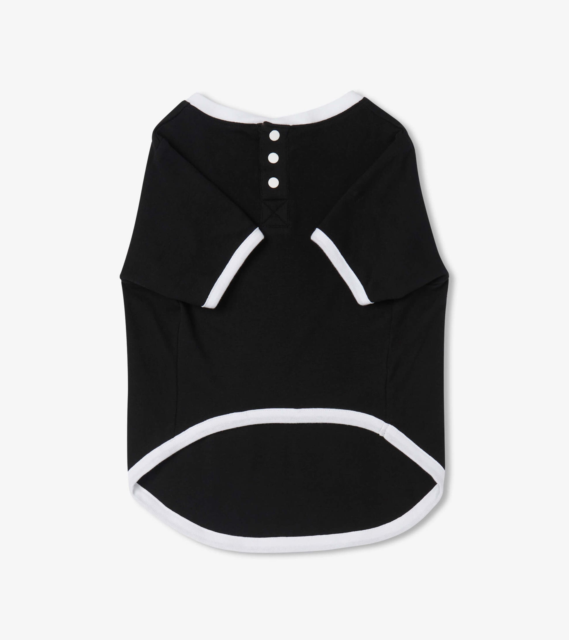 Black dog tee with white trim and button detail, featuring a relaxed fit and rounded hem.