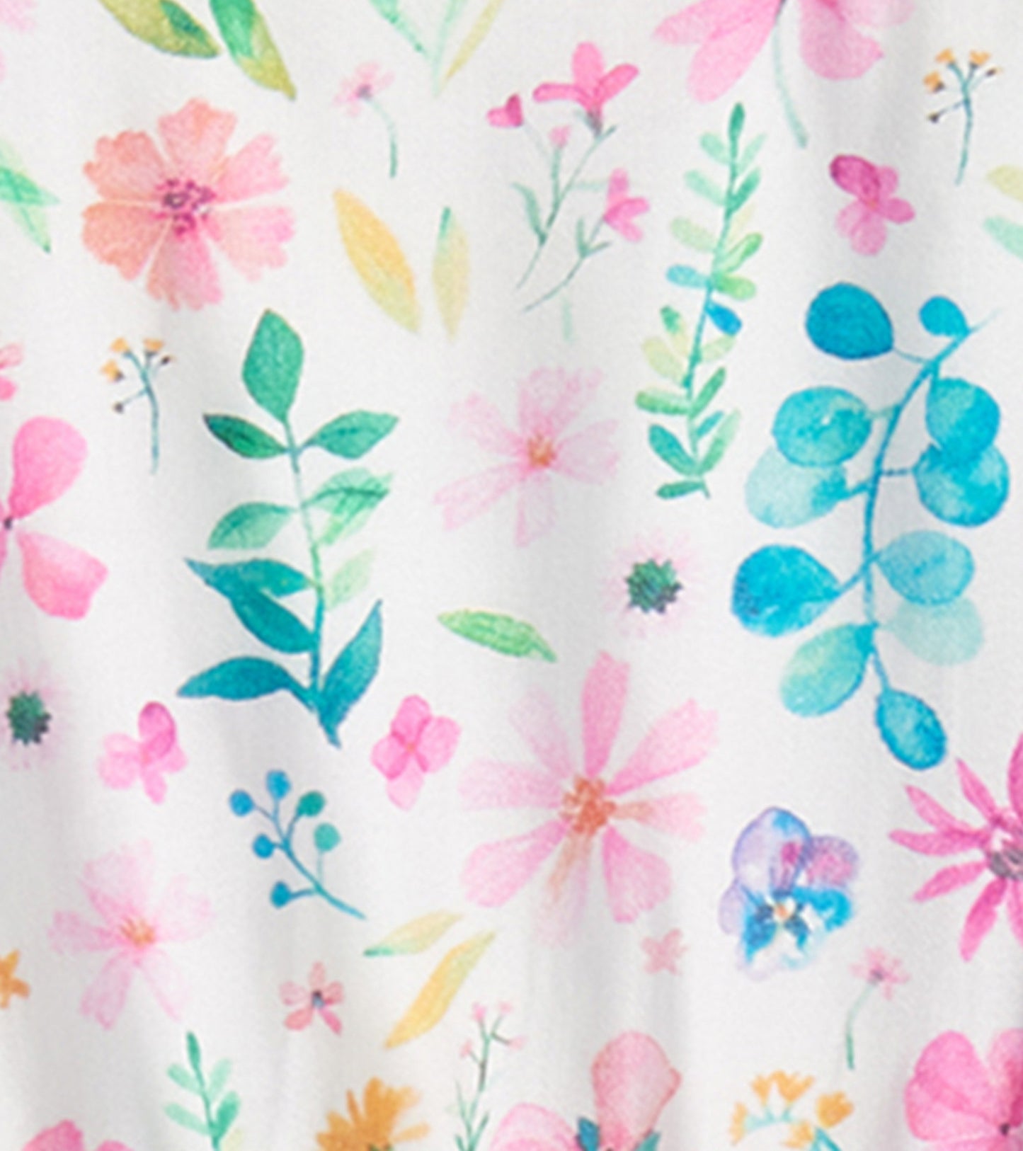 White dress featuring a colorful pressed flower pattern in pink, blue, and green hues. Ideal for casual wear.