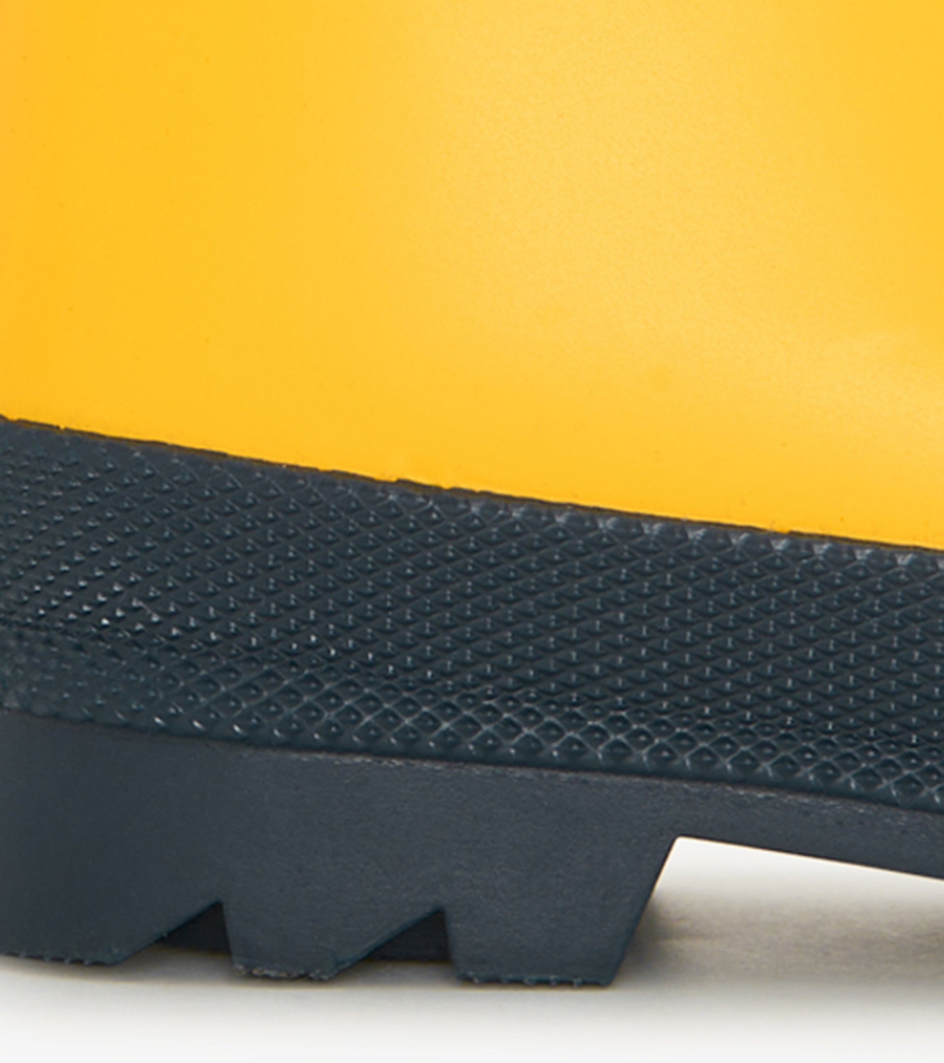 Yellow and navy matte rain boots with a textured sole, designed for kids.