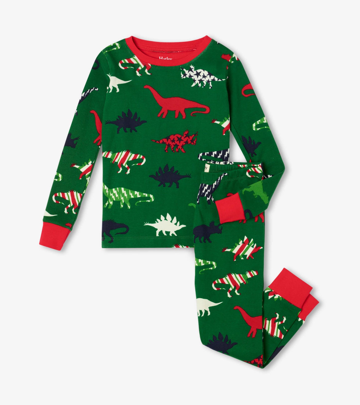 Green organic cotton kids' pajama set featuring colorful dinosaur patterns and red accents on cuffs and neckline.