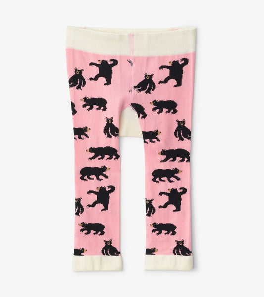 Pink baby tights featuring playful black bear patterns, with a soft waistband and contrasting cream cuffs.