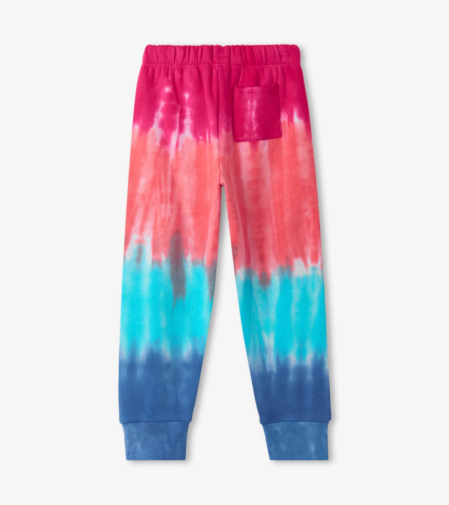 Relaxed joggers featuring a vibrant rainbow tie-dye pattern in pink, coral, blue, and navy with an elastic waistband and poc…