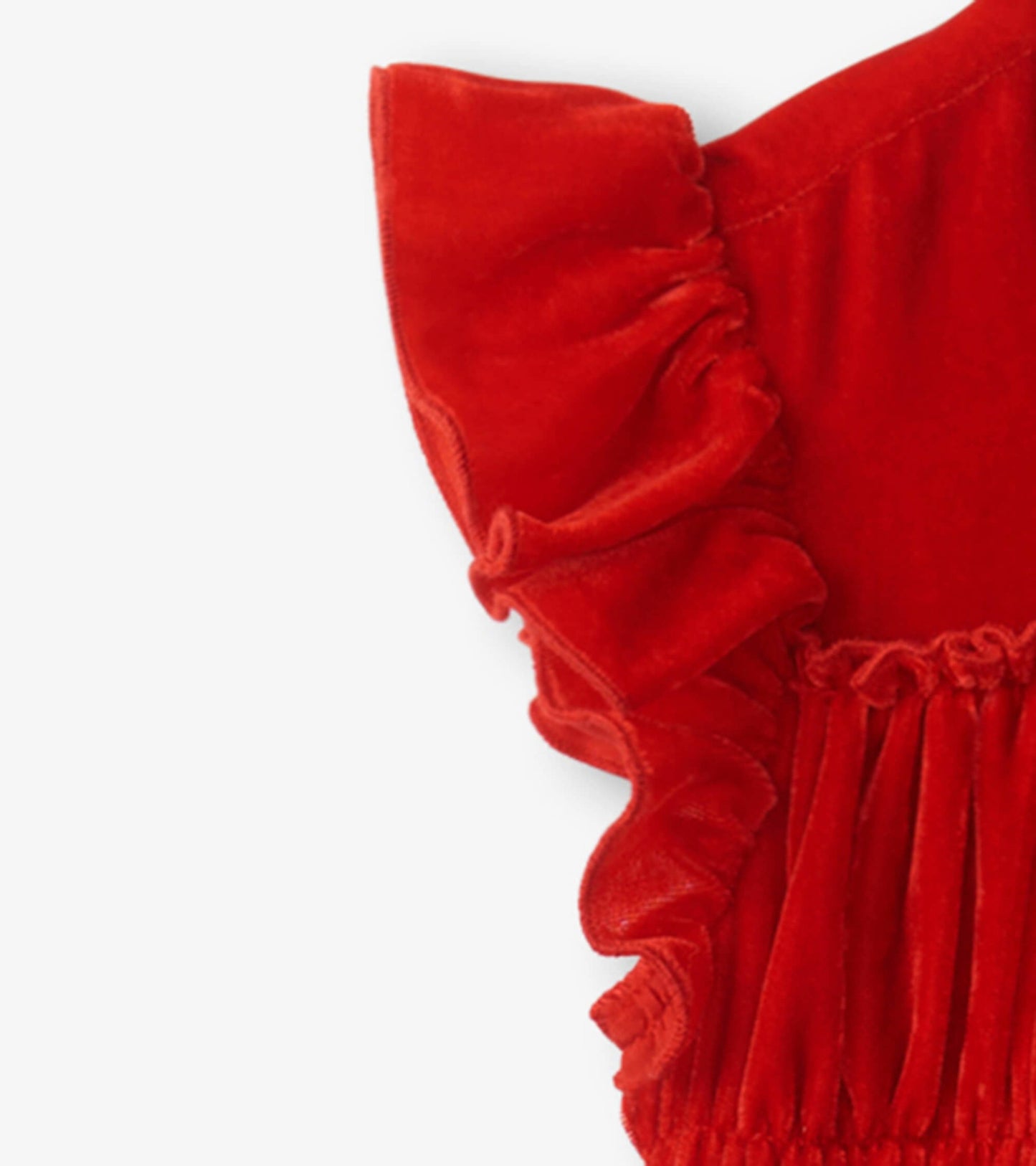 Red velvet dress featuring smocked panels and ruffled sleeves, ideal for casual or special occasions.