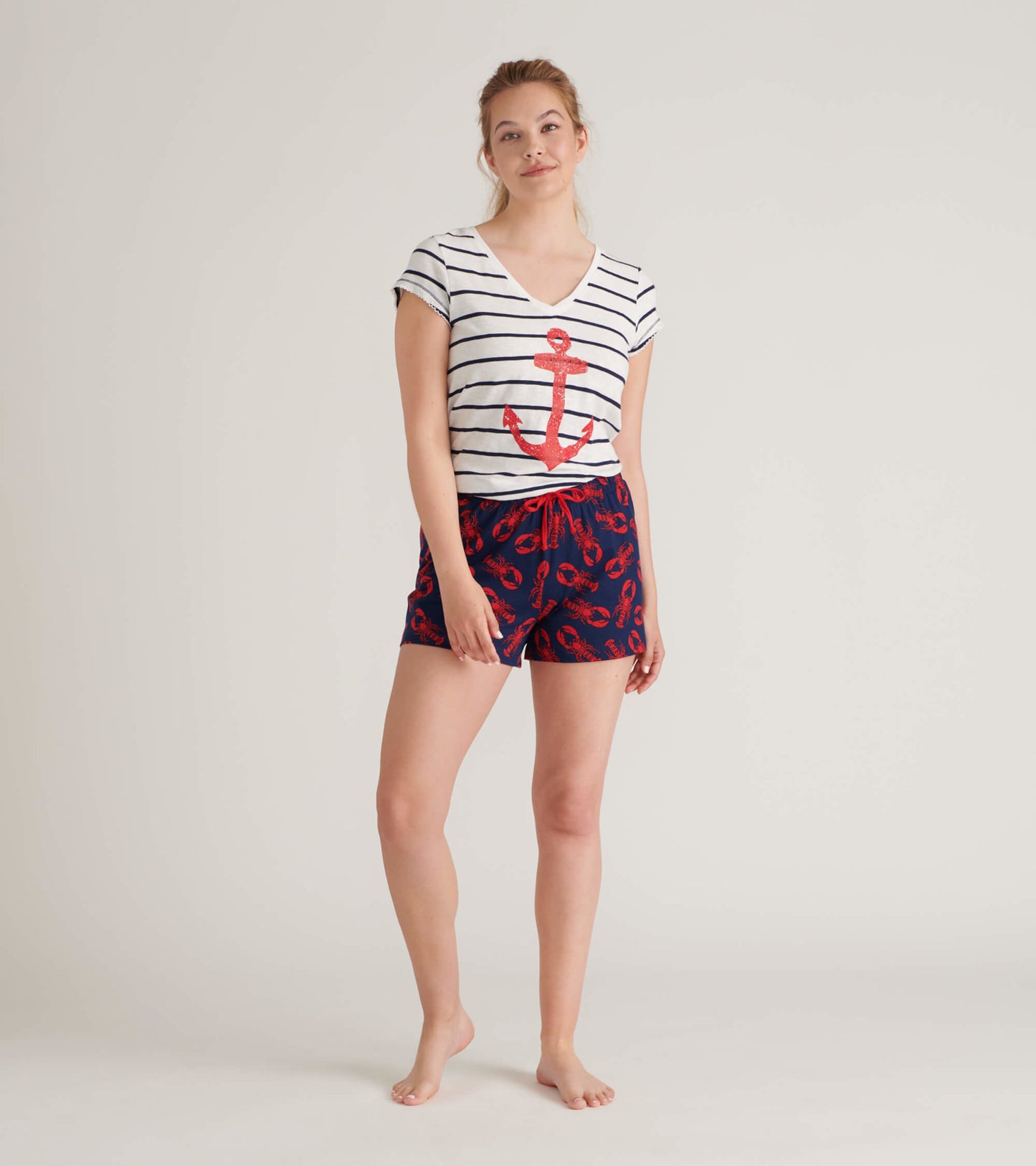 Navy cotton sleep shorts featuring a lobster pattern, designed for comfort and relaxation.